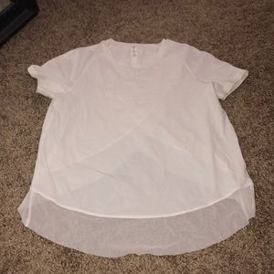 Open lower back white lulu shirt.